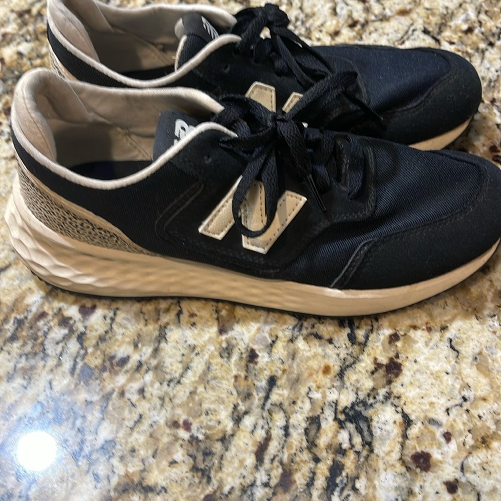 Size 8, black Nike, new balance, tennis shoes with cheetah print on heel